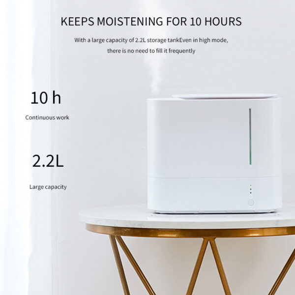 A table with an Intelligent Silent Air Humidifier 2.2L for Large Rooms and Baby Rooms.